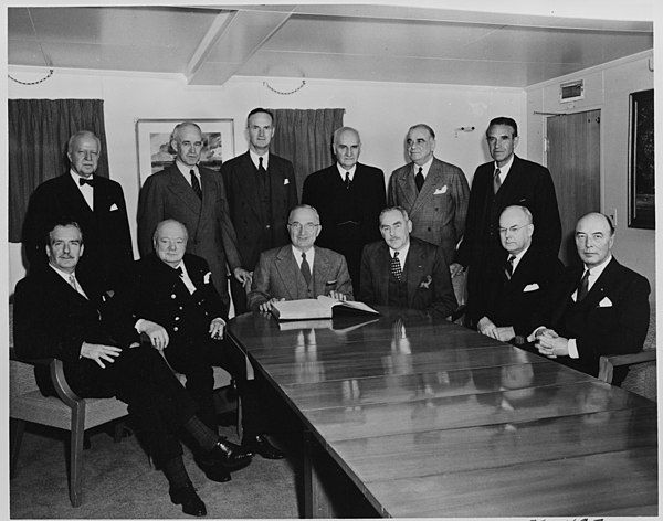 Franks (standing, 3rd from left), as ambassador to the US, at the meeting of Truman and Churchill aboard USS Williamsburg (1952)