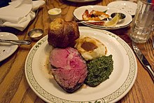 The restaurant's prime rib and Yorkshire pudding Prime Rib (23260912464).jpg