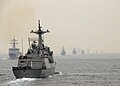 ROKS Kang Gamchan steams by a line of ROK Navy ships during the International Fleet Review.jpg