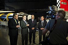 Reunion at the National Museum of the Air Force in 2015. Left to right: NRO chief historian James D. Outzen and former director Robert MacDonald, and MOL astronauts Al Crews and Bob Crippen. Reunion at the National Museum of the Air Force.jpg