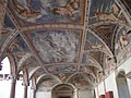 Lukisan dinding Romanino di Loggia del Cortile dei Leoni