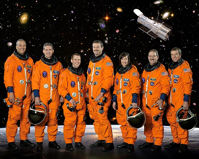 From left to right: Massimino, Good, Johnson, Altman, McArthur, Grunsfeld and FeustelSpace Shuttle program← STS-119STS-127 →