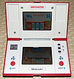 Safebuster Game & Watch by Nintendo, Model JB-63, Made in Japan, Copyright 1988 (Handheld Electronic Game).jpg