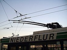 A trolleybus with a pair of trolley poles on the roof Stromabnehmer-obus-ganz.jpg