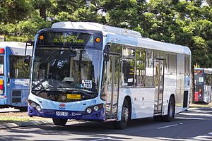 Sydney Buses (2457 ST) Custom Coaches 'CB80' bodied Scania K280UB on Olympic Boulevard at Sydney Olympic Park.jpg