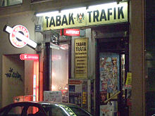 Tabak-Trafik in Vienna: Since January 1, 2007, all cigarette machines in Austria must attempt to verify a customer's age by requiring the insertion of a debit card or mobile phone verification. Tabak-Trafik 12.2006.jpg