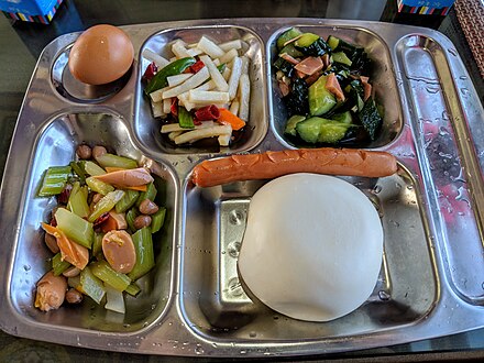 A typical dining car set meal: since there's an egg and a steamed bun instead of rice, you can tell it's breakfast, not dinner