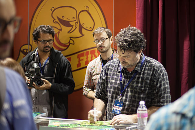 Tim Schafer and Drew Skillman with 2 Player Productions' Asif Siddiky at PAX Prime 2012