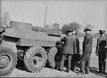 Secretary of War Henrey L. Stimson (back to camera) inspecting new trackless tank during demonstration at Fort Myer, Virginia.