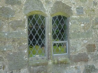 Two windows at St Mary's Church, Llanfair-yn-y-Cwmwd, Anglesey, Wales. 05.jpg