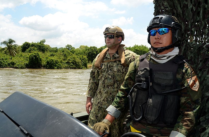 File:U.S. Navy Hospital Corpsman 1st Class Amran Hajiomar, left, assigned to Maritime Civil Affairs and Security Training Command, Security Forces Assistance Detachment, rides with Thai marines and sailors in 130608-N-RG360-191.jpg