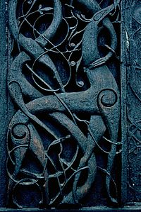 Detail in a door carving at Urnes Stave Church, Norway.