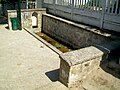 Le lavoir des Panilliers, au sud de la ruelle Saint-Ladre. Il est alimenté par un ruisseau issu de la source du Montcel. C'est le plus petit des lavoirs de Viarmes, non couvert.