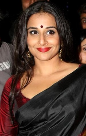 Vidya Balan is smiling at the camera.