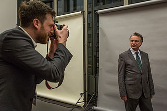 Wikimedian photographer shooting a parliament member