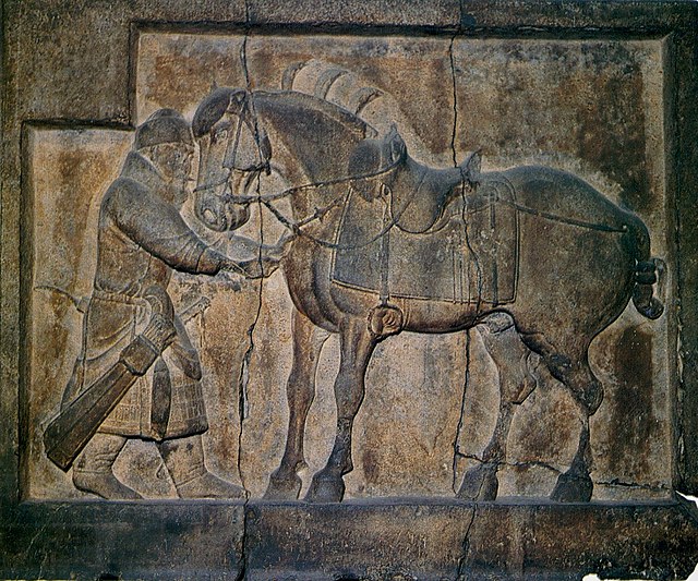 Relief of Li Shimin's charger Saluzi, one of the "Six Steeds of Zhao Mausoleum" by Yan Liben. The relief shows an incident during the Battle of the Ma