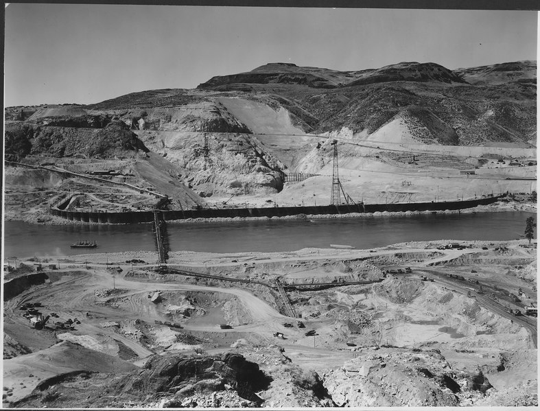 File:"East side excavation area in the foreground showing feeder belts to cross-river conveyor, cofferdam in distance." - NARA - 293963.tif