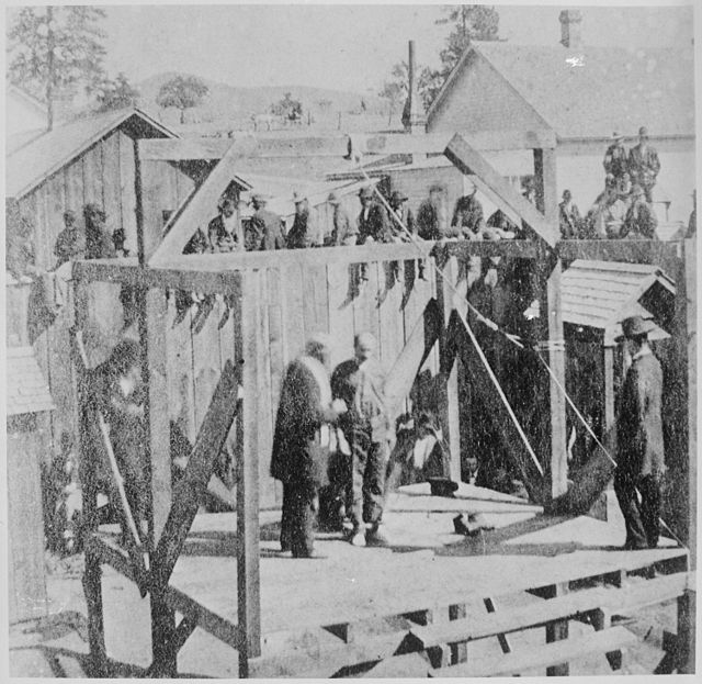 "Execution of a soldier of the 8th Infantry in Prescott, Arizona 1877" is the caption. In fact, it is the execution of Private James Malone of Company