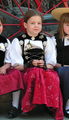 Girl from Switzerland with traditional clothing (Mädchen in Berner Sonntagstracht).