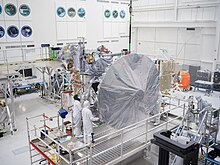 Engineers and technicians install Europa Clipper's high-gain antenna in the main clean room at JPL. 1-pia25957 europa-clipper-hga-installation-in-progress-1041.jpg