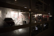 Fire sprinkling system activated at the Discount Tire store on University Avenue on May 28, 2020, after it had been set on fire. 20200528- DSC8038 (49948052112).jpg