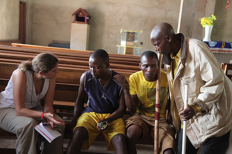 File:ASG assistant talking with victims at Kamako (7175524284).jpg