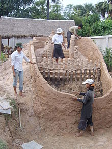 During the reconstitution of a traditional Cambodian kiln at Khmer Ceramics & Fine Arts Centre in Siem Reap, Cambodia Ancient Cambodian kiln reconstitution.jpg