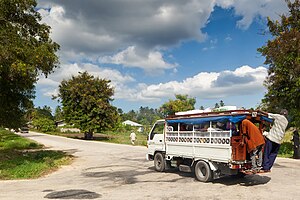 A dala dala on a rural road in Zanzibar. DalaDala.jpg