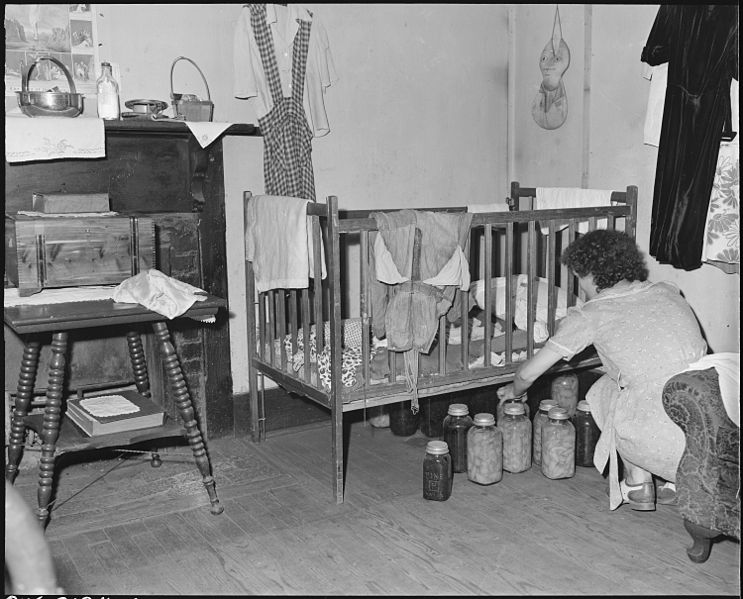 File:Daughter of Archie Isreal, miner. Two adults and five children live in this three room house which rents for $5.25... - NARA - 541123.jpg