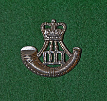 Queens crown cap badge of the Durham Light Infantry (1953--1968) Durham Light Infantry cap badge (Queens crown).jpg