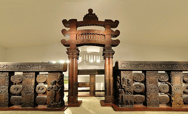 Top: Original layout of the Bharhut stupa. Bottom: East Gateway and Railings, Red Sandstone, Bharhut Stupa, 125–75 BCE. Indian Museum, Kolkata.