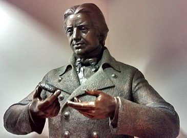 Statue af Edward Jenner ved indgangen til Jenner Institute