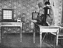 Ernst Ruhmer demonstrating his experimental television system, which was capable of transmitting 5x5 pixel images of simple shapes over telephone lines, using a 25-element selenium cell receiver (1909) Ernst Ruhmer demonstrating simple television system (1909).jpg