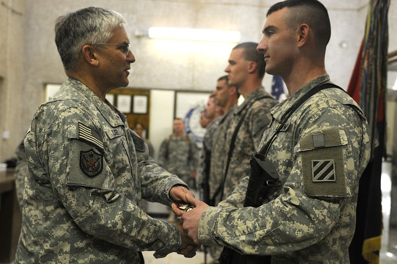 File:Flickr - The U.S. Army - Getting a coin from Gen. George W. Casey Jr..jpg