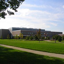 In January 2006 the sprawling St. Joseph's hospital complex was demolished and replaced with Mott Community College's Regional Technology Center, a sign of ongoing development in the East Village. Flint mott.JPG