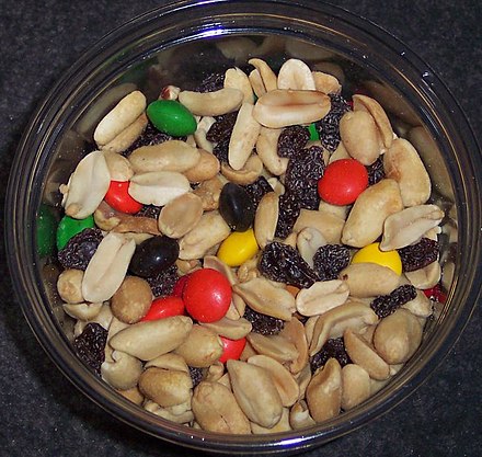 Trail mix is a classic snack food; here it is made with peanuts, raisins, and M&M's.