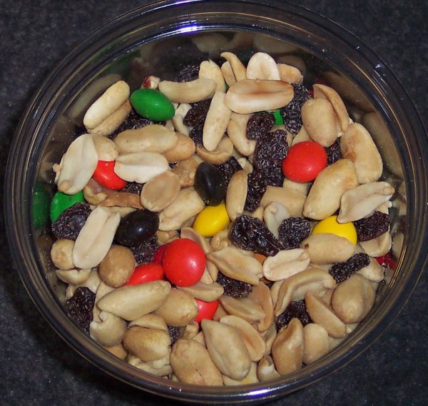 Trail mix is a classic snack food from America; here it is made with peanuts, raisins, and M&M's.