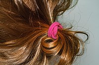 Rank: 19 Ponytail with hair tie on a toddler