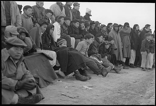 Heart Mountain Relocation Center, Heart Mountain, Wyoming. Football fans of Heart Mountain braved s . . . - NARA - 539465