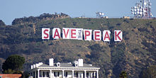 Who's House??? The HOLLYWOOD sign is supposed to be wrapped as