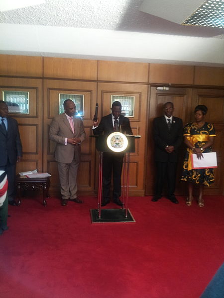 File:Hon Ababu Namwamba taking oath of office as Minister for Sports and Youth Affairs before President Mwai Kibaki at Harambee House, Nairobi 2013-08-23 17-37.jpg