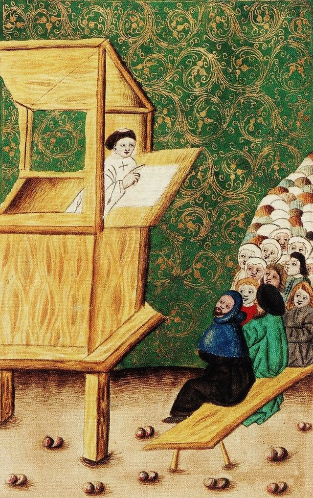 Miniature médiévale montrant un prêcheur enseignant une foule assise.