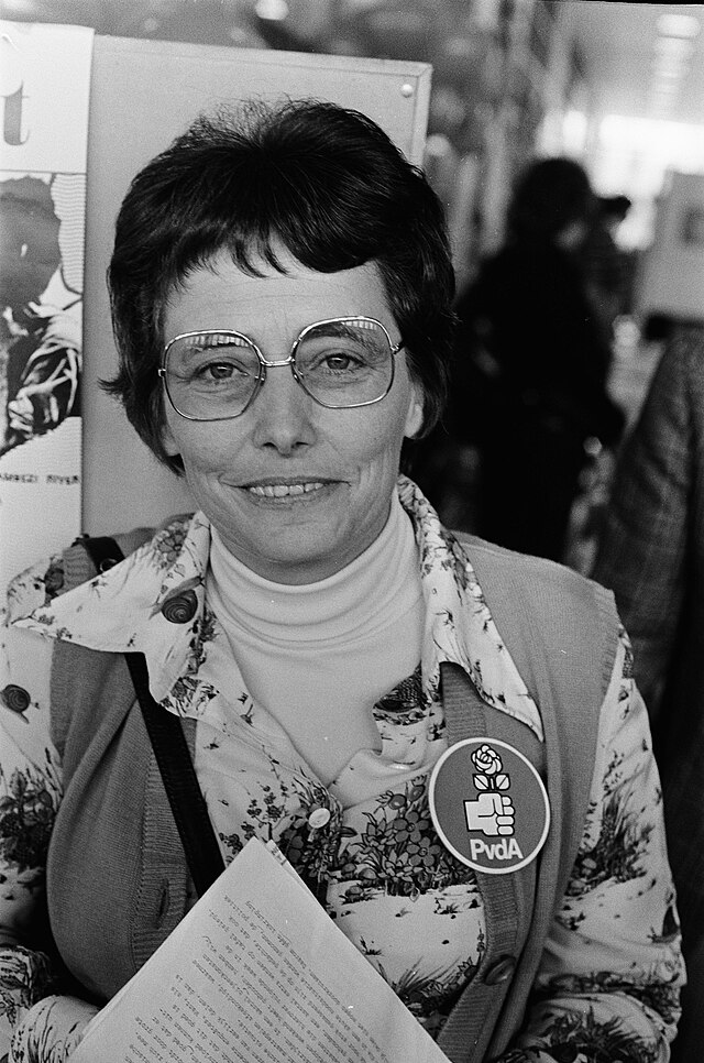 Black and white photograph of van Den Heuvel, wearing a badge of the PvdA