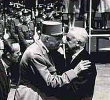 French president Charles de Gaulle kisses Argentine president Arturo Illia in 1964. Illiadegaulle.jpg