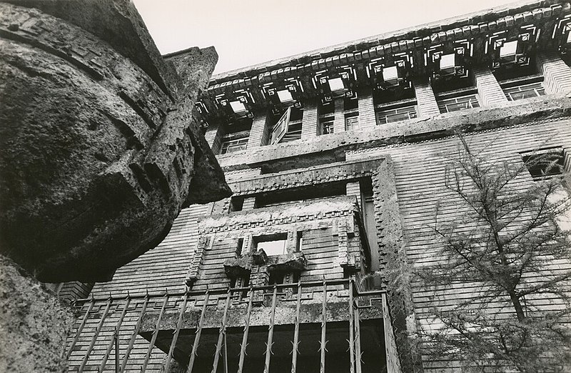 File:Imperial Hotel Exterior Wall and Stone Urn.jpg