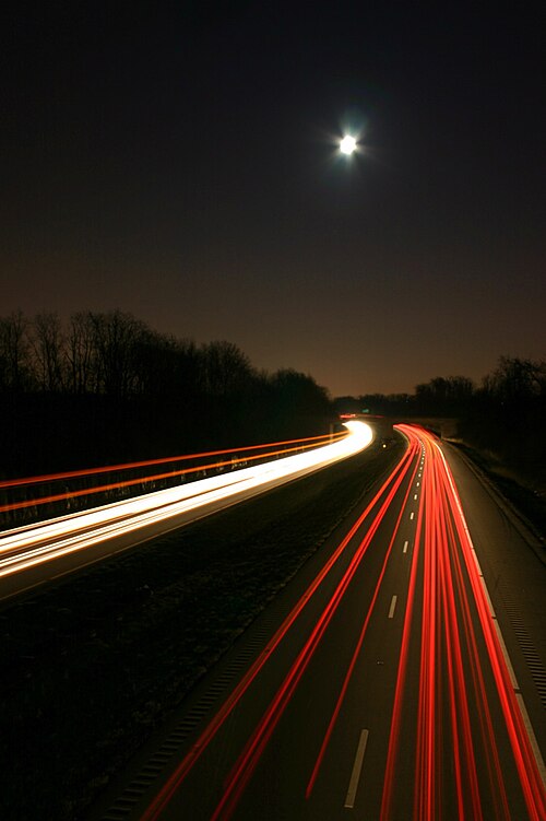 Streaking lights on I-64 as seen from the horse/bike bridge at Seneca Park in Louisville