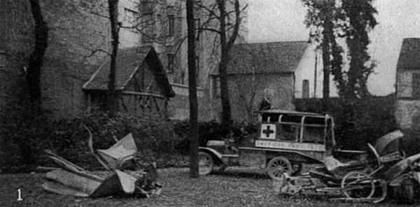 The remains of two ambulances destroyed by German shell-fire brought to Paris