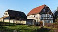 House and barn of a two-sided courtyard