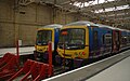 2015-02-06 First Capital Connect 365507 and 365515 stand at King's Cross.