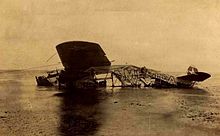 Richard Byrd's Fokker "America" was completely written off after its forced ditching in the Atlantic in June 1927. Byrd and three others survived. The original destination Paris was socked in by fog making a landing impossible at LeBourget. Souvenir hunters stripped the aircraft of its fabric skin and other components. L'America Ver sur mer.jpg
